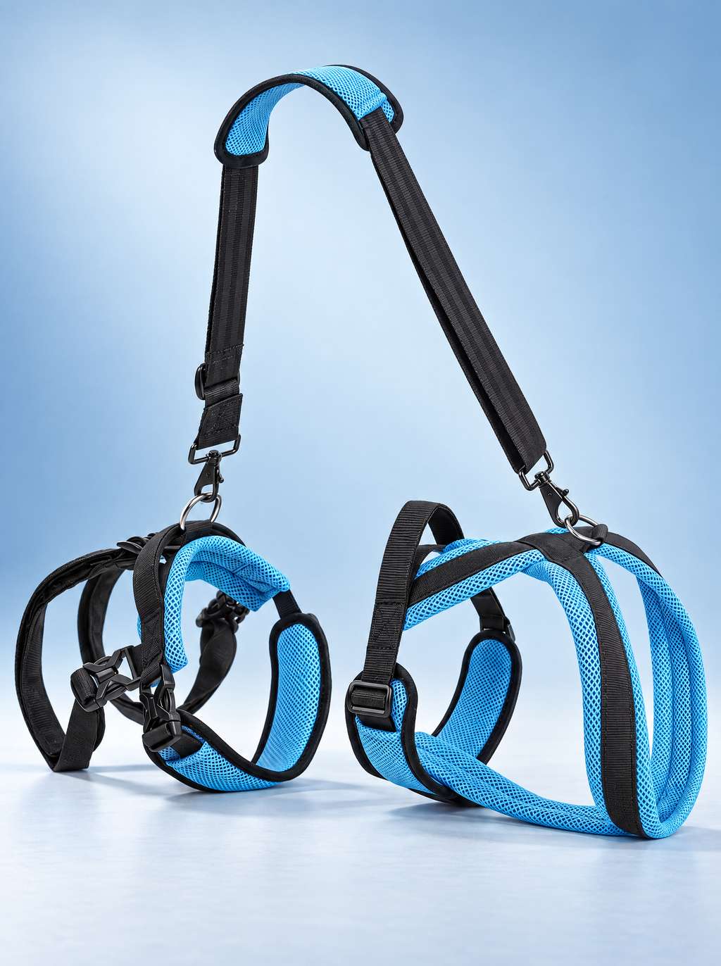 Hind Lift two-piece harness: chest piece, rear piece with two leg loops, and a detachable shoulder strap with two handles (product render)